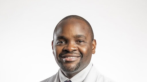 Official UAMS photos of Dr. Gilbert-Roy Kamoga