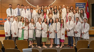 On Aug. 23, the Class of 2024 in the Physician Assistant Studies Program stood for one final group photo together after a valediction ceremony.