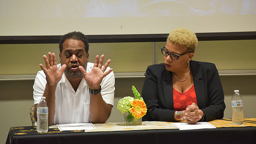 Joseph Richardson, MPower professor of African American studies, medical anthropology and epidemiology at the University of Maryland, and Tanya L. Sharpe, associate professor and Factor-Inwentash Chair in Social Work in the Global Community at the University of Toronto, participate in a question-and-answer session at the Public Health Summit.