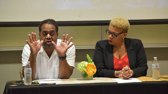 Joseph Richardson, MPower professor of African American studies, medical anthropology and epidemiology at the University of Maryland, and Tanya L. Sharpe, associate professor and Factor-Inwentash Chair in Social Work in the Global Community at the University of Toronto, participate in a question-and-answer session at the Public Health Summit.