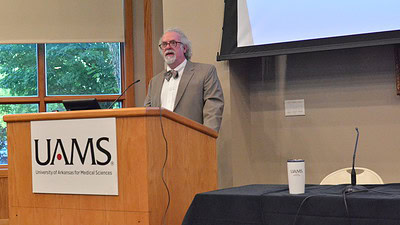 Jeffrey Clothier, M.D., medical director of the UAMS Psychiatric Research Institute, gives the keynote address at the UAMS neurodiversity conference