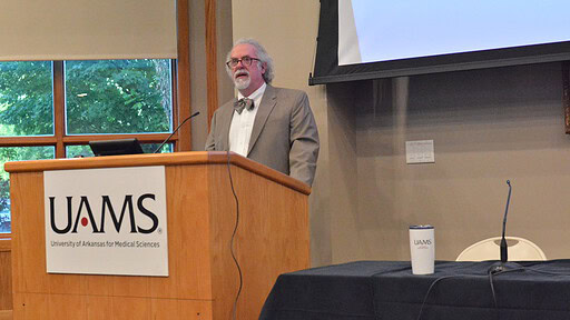 Jeffrey Clothier, M.D., medical director of the UAMS Psychiatric Research Institute, gives the keynote address at the UAMS neurodiversity conference