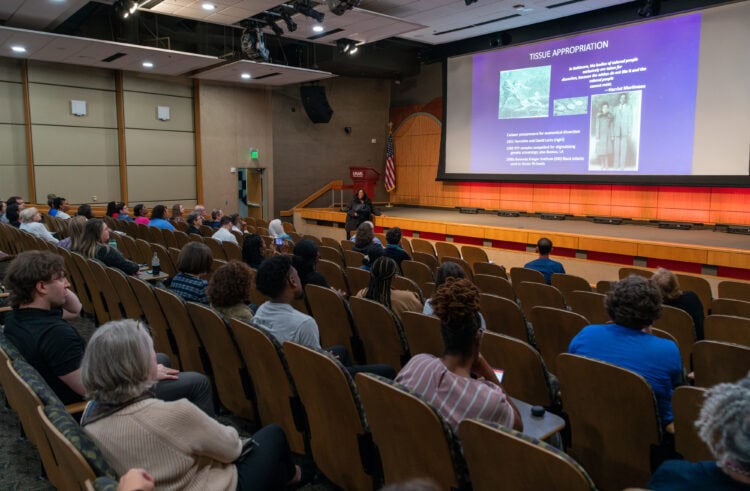 The audience filled most of the seats in the auditorium to hear Washington's presentation.