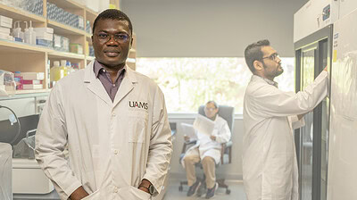 Marius Nagalo, Ph.D., (left) is the first UAMS researcher to receive the prestigious New Innovator Award from the National Institutes of Health.