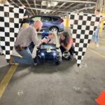 Three Northwest Arkansas children with mobility issues received modified ride-on cars from the UAMS/UA Occupational Therapy Department as part of the GoBabyGo program.