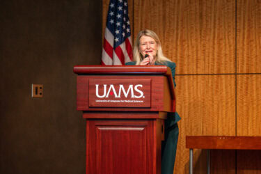 Patricia Cowan, dean of the UAMS College of Nursing, introduces Beverly Malone as part of the college’s Claudia Beverly Lectureship in Nursing Leadership.