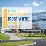 A logo for the CHIME Digital Health Most Wired honor is shown over a photo of the UAMS Medical Center in Little Rock.