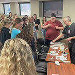 Medical professionals talk with high school students