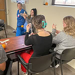 Medical professionals talk with high school students