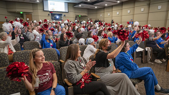 Employees celebrate the announcement of UAMS’ designation as a Magnet® hospital from the American Nurses Credentialing Center.