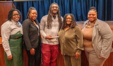 Representatives of the Barbershop Talk research project include (l-r) Camille Hart, research program director, and Steering Committee members Jasmine Nesby, Roderick Vincent and Amanda Benton; Jennifer Coopwood (right) is the project’s community health coordinator.