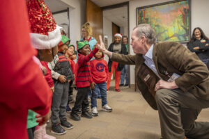 Dr. Patterson high-fives a