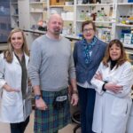 The multidisciplinary UAMS research team is testing promising findings that could lead to better treatments for hormone loss caused by a malfunctioning pituitary gland. Team members include (l-r) Angela Odle, Ph.D., Angus MacNicol, Ph.D., Melanie MacNicol, Ph.D., and Gwen Childs, Ph.D. Not pictured is Stephanie Byrum, Ph.D.