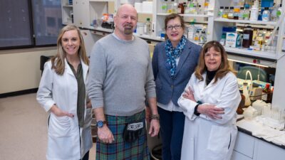 The multidisciplinary UAMS research team is testing promising findings that could lead to better treatments for hormone loss caused by a malfunctioning pituitary gland. Team members include (l-r) Angela Odle, Ph.D., Angus MacNicol, Ph.D., Melanie MacNicol, Ph.D., and Gwen Childs, Ph.D. Not pictured is Stephanie Byrum, Ph.D.