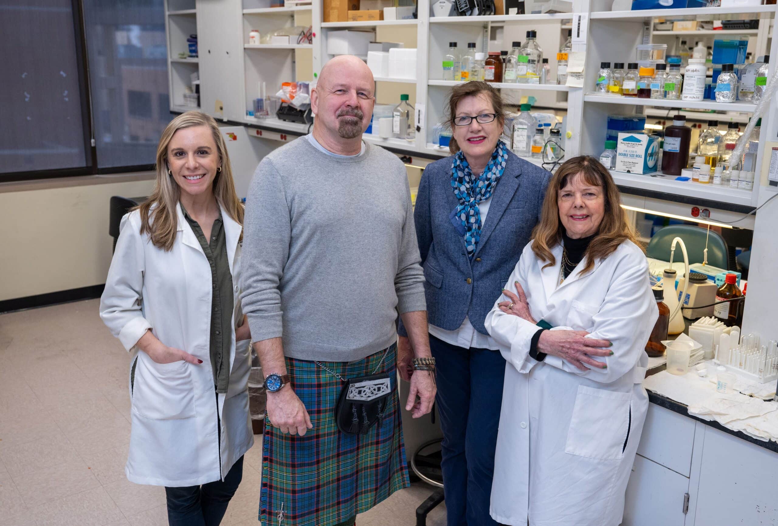 The multidisciplinary UAMS research team is testing promising findings that could lead to better treatments for hormone loss caused by a malfunctioning pituitary gland. Team members include (l-r) Angela Odle, Ph.D., Angus MacNicol, Ph.D., Melanie MacNicol, Ph.D., and Gwen Childs, Ph.D. Not pictured is Stephanie Byrum, Ph.D.