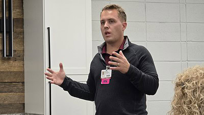 Denton Thompson, a nurse project manager with the UAMS Institute for Community Health Innovation speaks at the Carroll County Hometown Health Coalition’s Dec. 4, 2024, meeting.