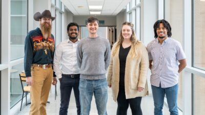 UAMS researcher Craig Forrest, Ph.D. (center), and his lab team hope their work will ultimately lead to a cancer vaccine. With Forrest are (l-r) Sheldon Zeltner, Chandra Penthala, Shana Owens, Ph.D., and Steven Murdock, Jr.