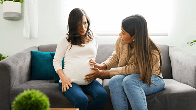 Doula speaking to a pregnant woman