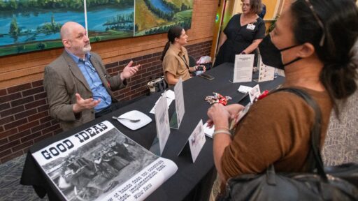 Geoffrey Curran, Ph.D., discusses implementation science opportunities with attendees of the 2024 Translational Research Institute Research Expo.