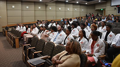 Students from UAMS’ Health Career University programs gather for a 2023 ceremony that celebrated their achievements. Health Career University helps students from rural and medically underserved communities gain exposure to health professions and advice on how to get into academic institutions like UAMS.