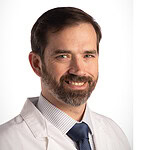 portrait photo of Mark O. Hardin, M.D., and UAMS logo
