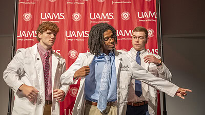 Cameron Bryant COP white coat 2025