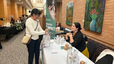TRIStephanie M. Lopez-Neyman, Ph.D., MPH, RD (left), visits with Stefanie Kennon-McGill, Ph.D., representing BioVentures LLC, during Research Expo 2025.