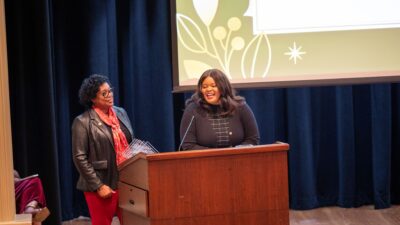 Nakita Lovelady, Ph.D. (right), and Joyce Raynor discussed their Project Heal research program at the 2024 Community Partner Celebration sponsored by the UAMS Translational Research Institute.