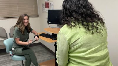 Samantha Crouch (left), DNP, CNM, is an assistant professor in the UAMS College of Nursing and director of the Nurse-Midwifery Program.