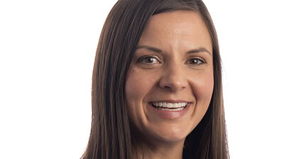 Headshot of Page Dobbs, associate professor in the College of Public Health