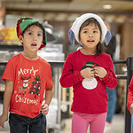 Head Start students sing for UAMS employees and guests in 2024.