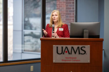 Sarah Rhoads, dean of the UAMS College of Nursing, praised the students for demonstrating hard work, discipline, and commitment to their goal of entering the nursing profession. Here, she's shown speaking at the scholarship reception.