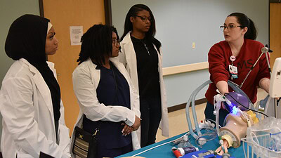 Students from the Hall-West High School of Innovation explored a variety of health care specialties, including respiratory therapy, during their six days at the University of Arkansas for Medical Sciences.