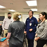 Dr. Barnes speaks to a group of family medicine residents