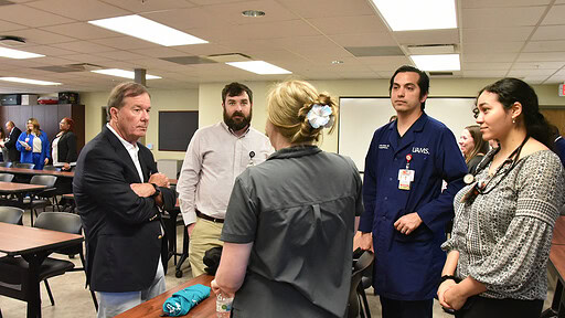 Dr. Barnes speaks to a group of family medicine residents