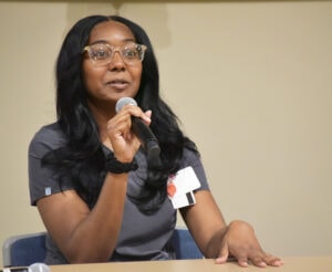 Marissa Bones, fourth-year pharmacy student, addresses a question