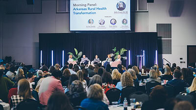 Members of a panel discuss rural health at the Northwest Arkansas Health Summit at the Fayetteville Town Center
