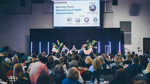 Members of a panel discuss rural health at the Northwest Arkansas Health Summit at the Fayetteville Town Center