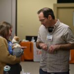 Jan Williams chats with another attendee during the 2026 Arkansas Brain Injury Survivors’ Day.