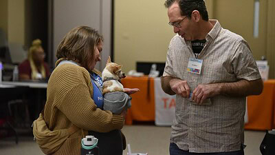Jan Williams chats with another attendee during the 2026 Arkansas Brain Injury Survivors’ Day.