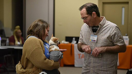 Jan Williams chats with another attendee during the 2026 Arkansas Brain Injury Survivors’ Day.