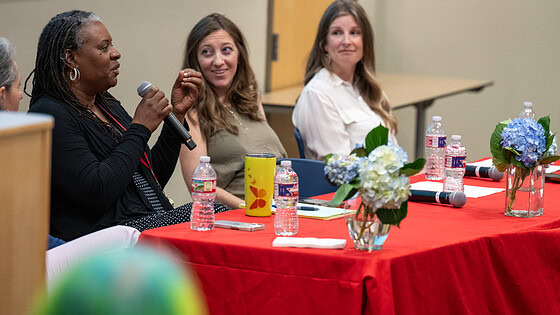 Keneshia Bryant-Moore, professor in the UAMS Fay W. Boozman College of Public Health, speaks during the Arkansas Nursing Research Day panel on maternal health.