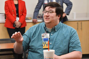 Austin McNamara, M.D., a faculty member at UAMS North Central, asks a question
