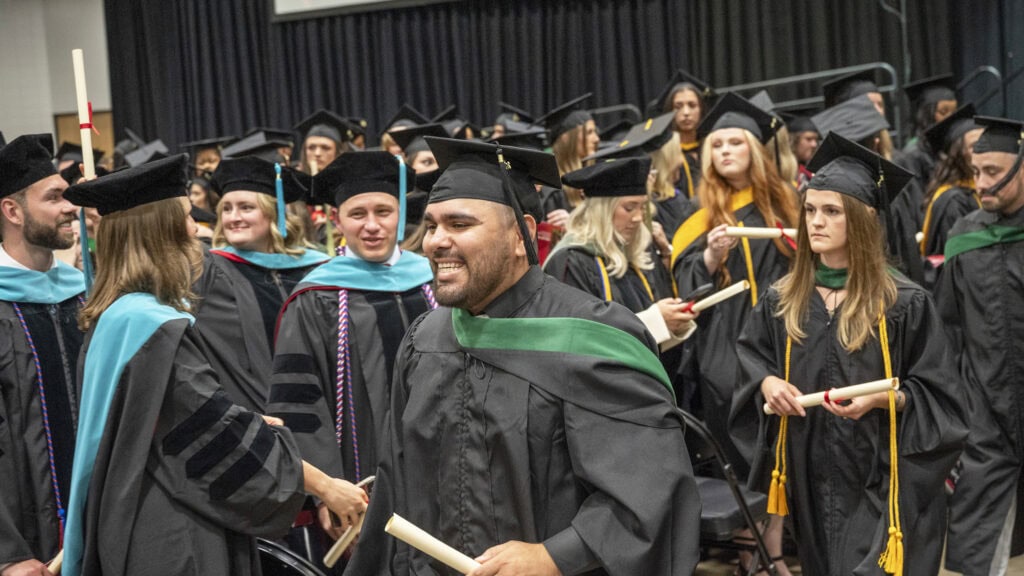 <p>With diplomas in hand, new graduates of the College of Health Professions class of 2026 prepare to exit the Statehouse Convention Center after the commencement ceremony.</p>
<div><a class="more" href="https://news.uams.edu/2026/05/27/college-of-health-professions-celebrates-graduates-strong-growth-at-commencement/chp-commencement-2026-featured/">Read more</a></div>