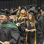 With diplomas in hand, new graduates of the College of Health Professions class of 2026 prepare to exit the Statehouse Convention Center after the commencement ceremony.