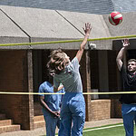 Physician Assistant Studies students play volleyball on the new court surface..