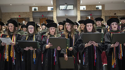 Graduates from the UAMS College of Pharmacy take part in this year’s commencement exercises.
