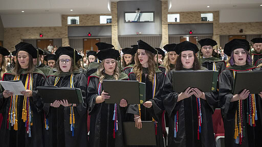 Graduates from the UAMS College of Pharmacy take part in this year’s commencement exercises.