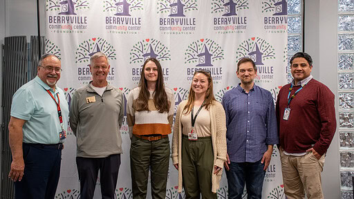 Members of the UAMS Institute for Community Health Innovation and representatives from the Berryville Community Center pose together.