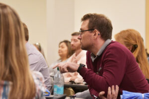 Daniel Lockert, M.D. looks on from the crowd